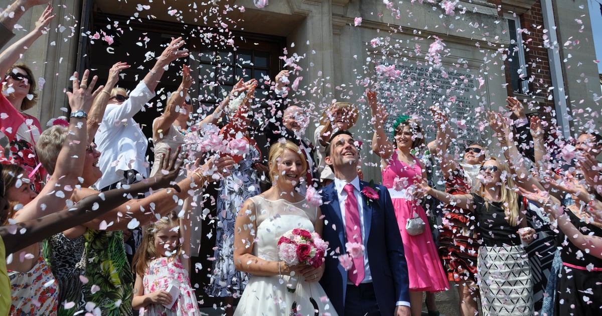 Wedding venue coordinator greeting DJ Tony Winyard before a reception setup
