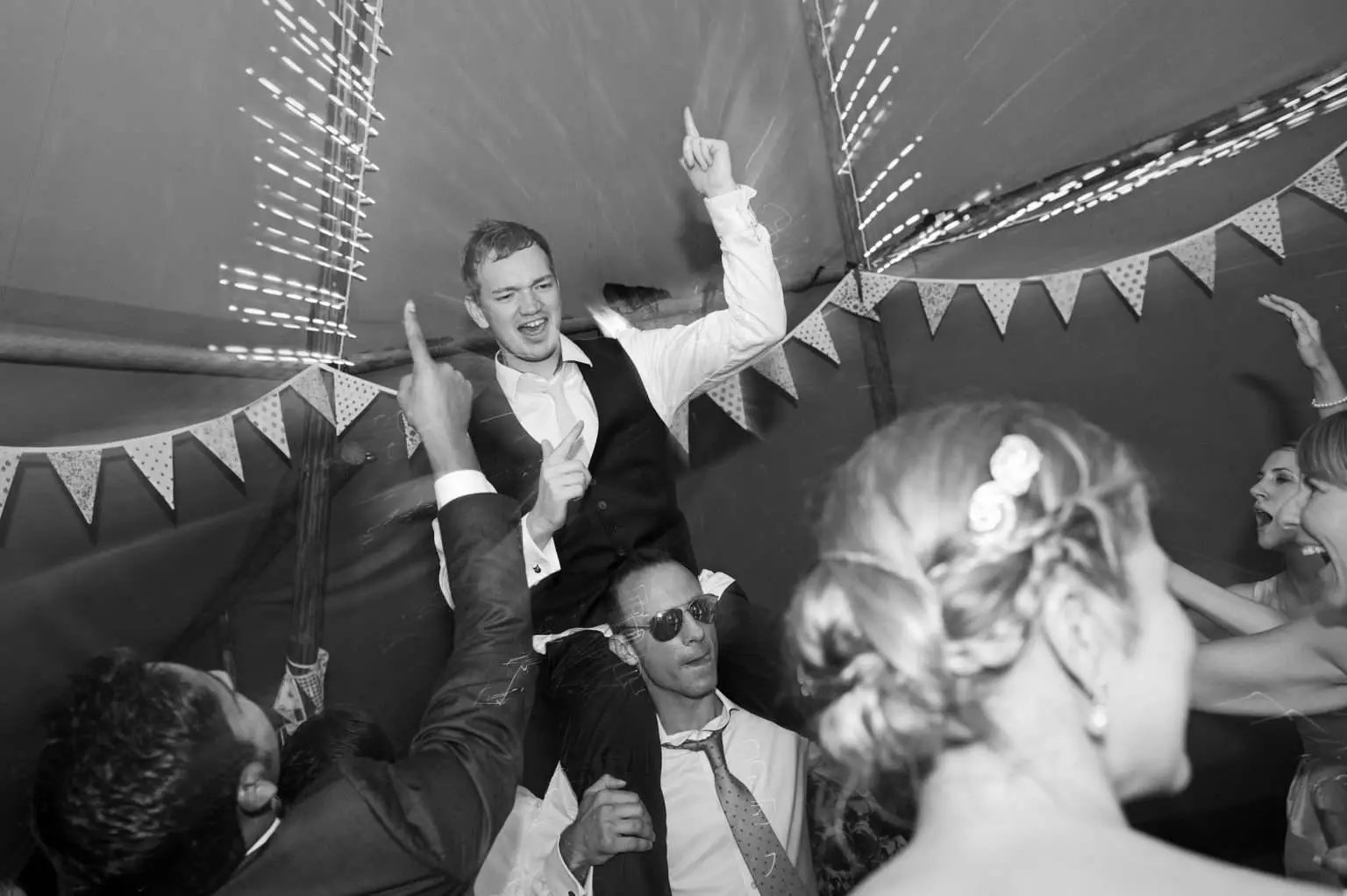 Couple celebrating at their personalised, non-traditional wedding