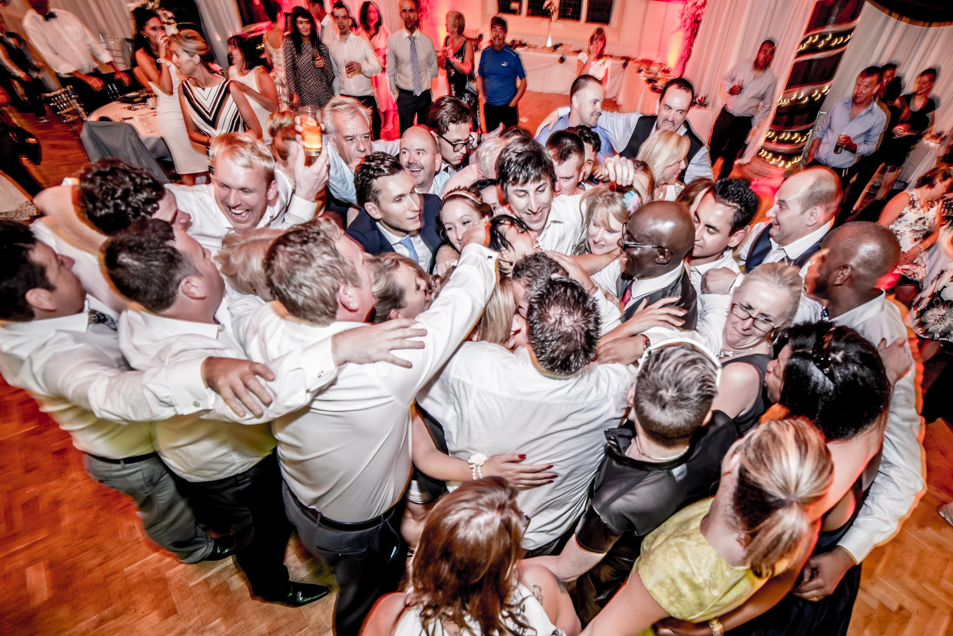 Live band and DJ setup at a wedding celebration